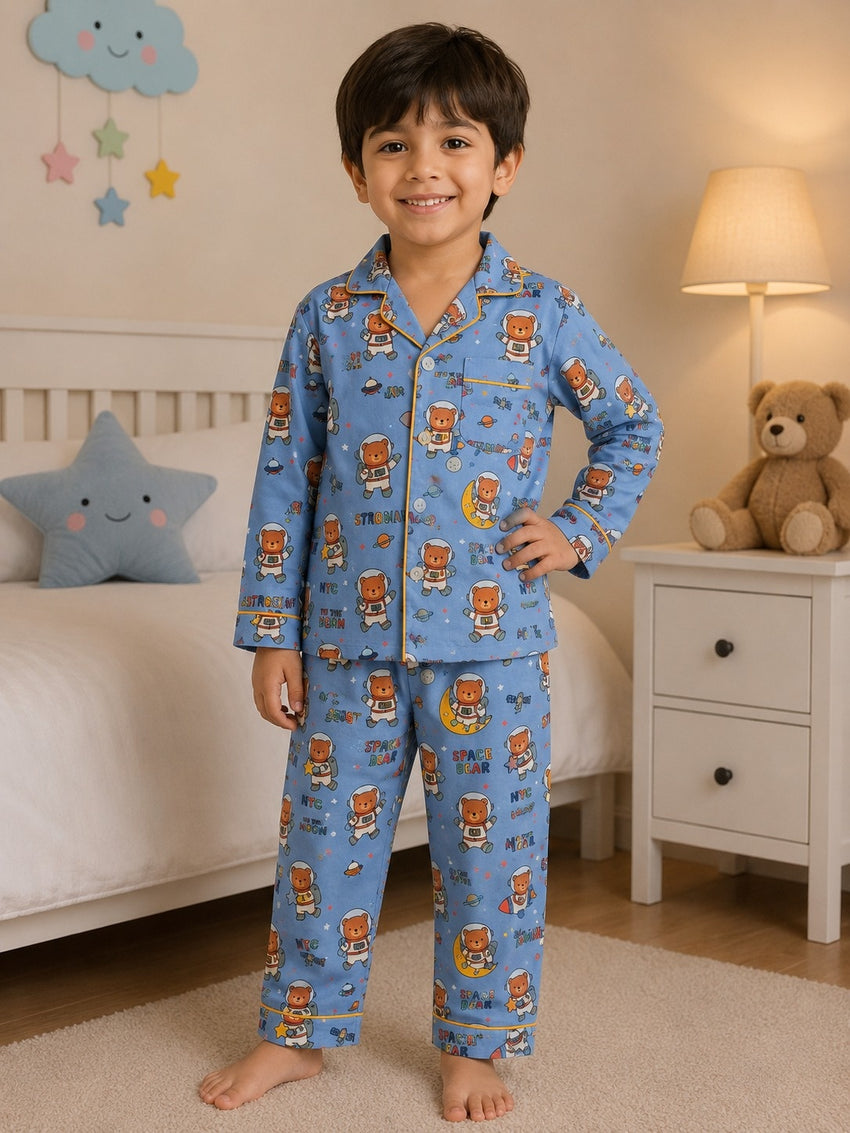Child wearing a colorful butterfly print pajama set