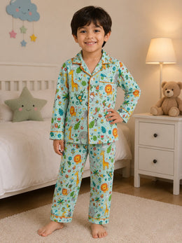 Child wearing a colorful bird and nature print pajama set